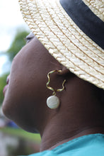 Load image into Gallery viewer, dark skinned lady wearing Giana Natural Pearl drop loop earrings