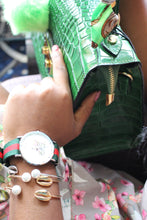 Load image into Gallery viewer, Lady wearing Tonbey Jewelry holding green Crocodile embossed leather bag 
