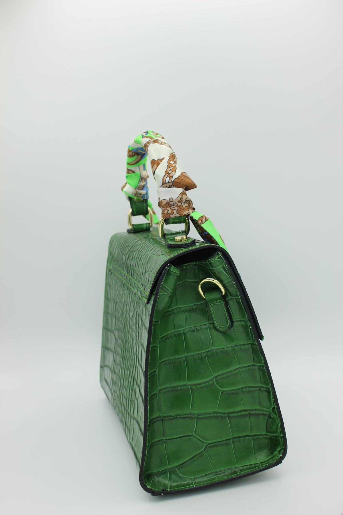 Green Crocodile embossed leather bag side view